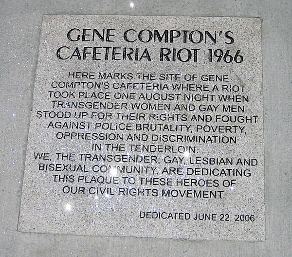 A grey, stone plaque with a paragraph of text commemorating Gene Compton's Cafeteria Riot of 1966, dedicated in 2006.