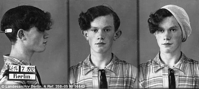 Three black and white mugshots of Johann Sheff, a young, white trans person wearing a checked shirt and black tie.